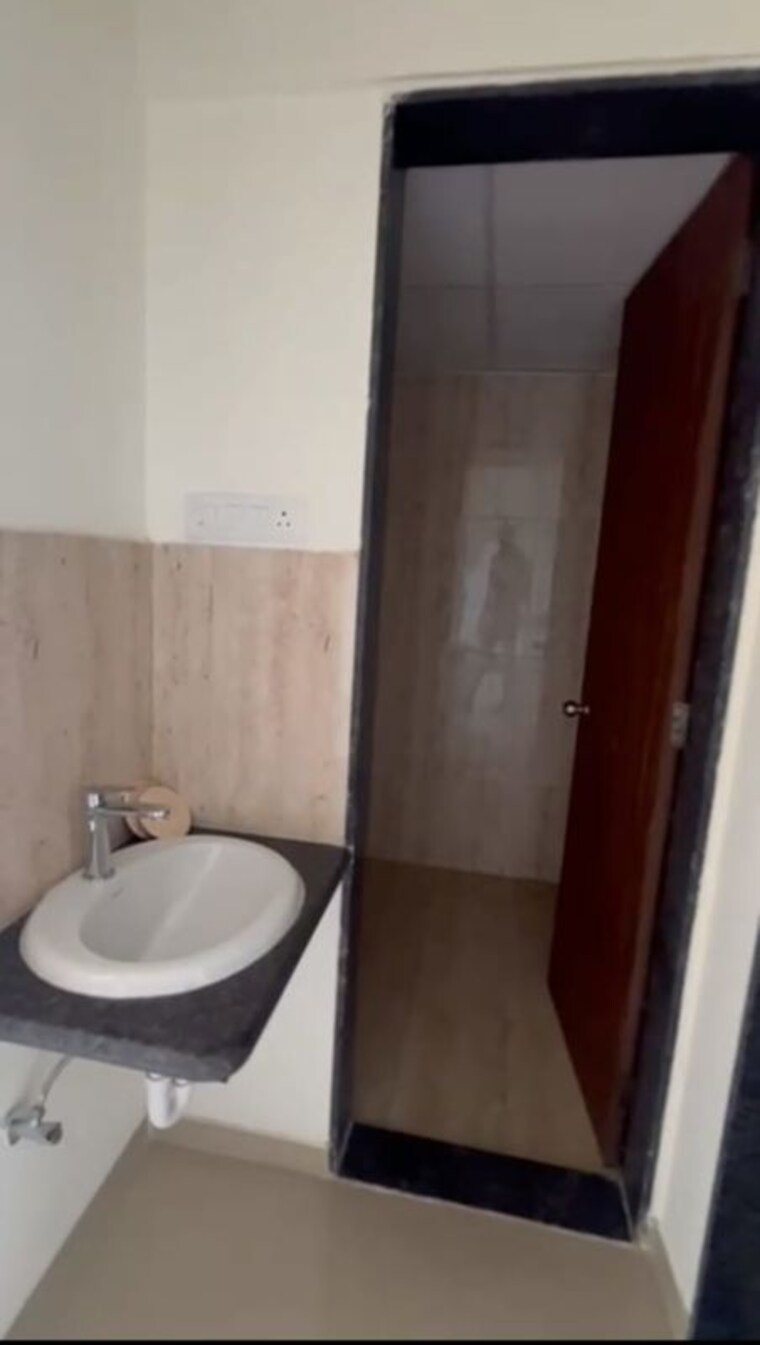 Bathroom, kolte-patil-life-republic 1 Bedroom 457 Sq.Ft. Apartment In Hinjewadi Pune 10767373