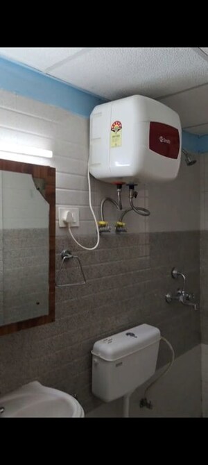 Bathroom in 2 BHK Apartment at Signature Global Orchard Avenue, Sector 93 – for Rent