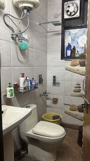 Bathroom in 3 BHK Builder Floor at Mansarovar Park – for Sale