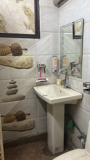 Bathroom in 3 BHK Builder Floor at Mansarovar Park – for Sale