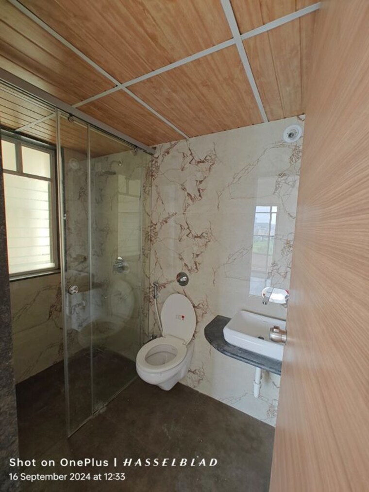 Bathroom, sukhwani-skylines 2 Bedroom 821 Sq.Ft. Apartment In Wakad Pune 10767546