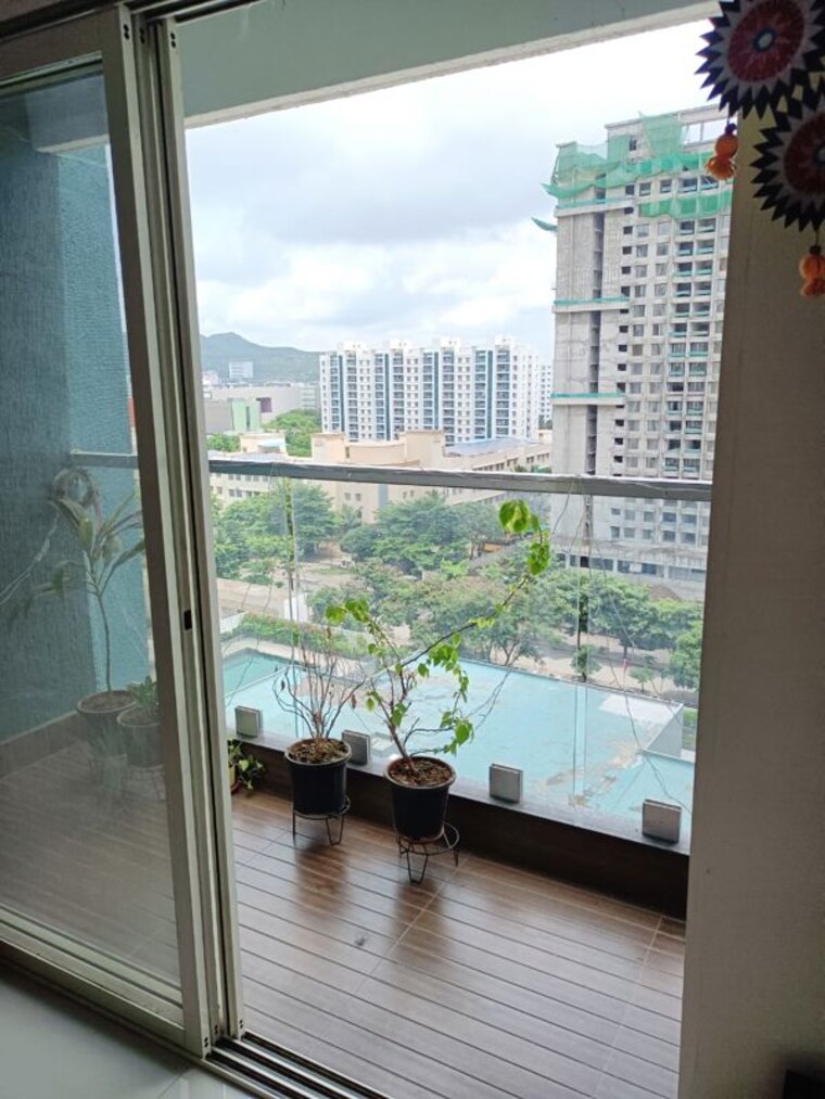 Balcony, pegasus-megapolis-serenity 2 Bedroom 637 Sq.Ft. Apartment In Hinjewadi Pune 10767549