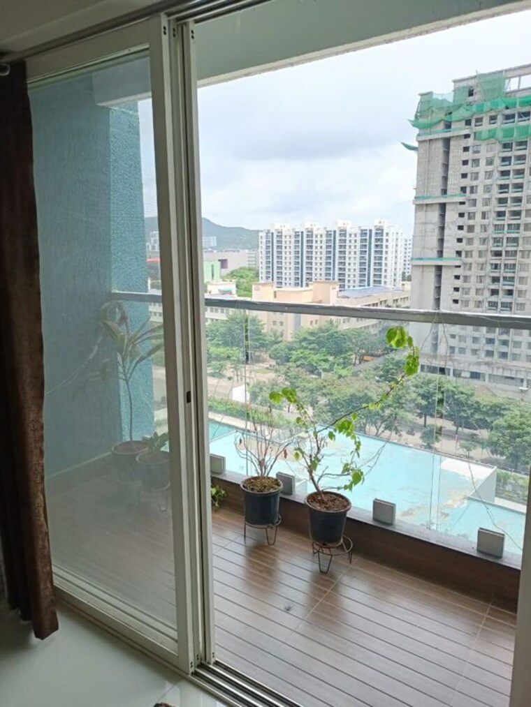 Balcony, pegasus-megapolis-serenity 2 Bedroom 637 Sq.Ft. Apartment In Hinjewadi Pune 10767549