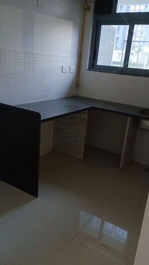 Kitchen in 1.5 BHK Apartment at Kalpataru Elitus, Mulund West – for Rent