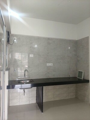 Kitchen in 2 BHK Apartment at Rama Livmo, Hinjewadi – for Rent