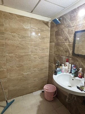 Bathroom in 3 BHK Apartment at Gaur Sportswood, Sector 79 – for Rent