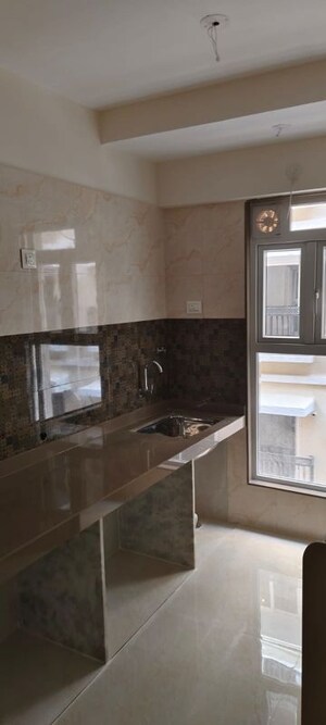 Kitchen in 1 BHK Apartment at Vaibhavlaxmi Queens Avenue, Chembur – for Rent