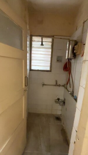Bathroom in 1 BHK Apartment at Swapna Sangeet CHS, Mulund West – for Rent
