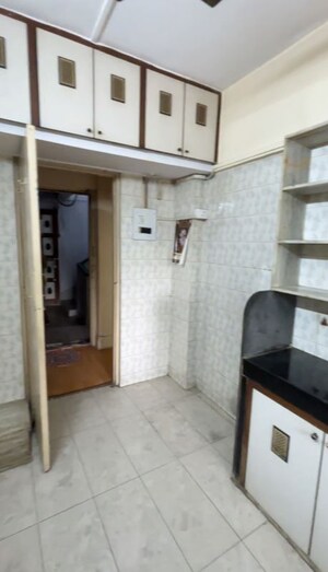 Kitchen in 1 BHK Apartment at Swapna Sangeet CHS, Mulund West – for Rent