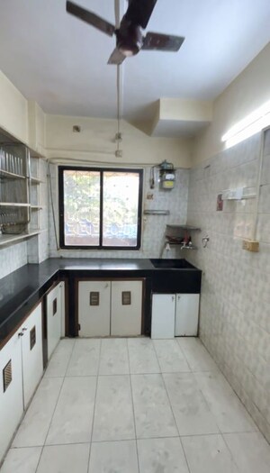 Kitchen in 1 BHK Apartment at Swapna Sangeet CHS, Mulund West – for Rent