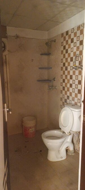 Bathroom in 2 BHK Apartment at Uninav Heights Phase I, Raj Nagar Extension – for Rent