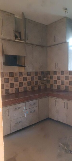 Kitchen in 2 BHK Apartment at Uninav Heights Phase I, Raj Nagar Extension – for Rent