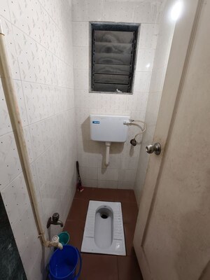 Bathroom in 1 RK Apartment at Sanjay Gandhi Nagar CHS, Malad East – for Rent
