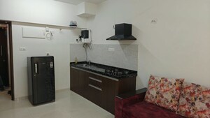 Kitchen in Studio Apartment at Gera World of Joy, Kharadi – for Rent