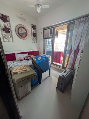 Living Room in 2 BHK Apartment at Kandivali West – for Rent