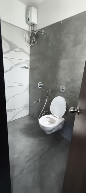 Bathroom in 1 BHK Apartment at Raunak Unnathi Woods Phase 7 A And B, Ghodbunder Road – for Rent