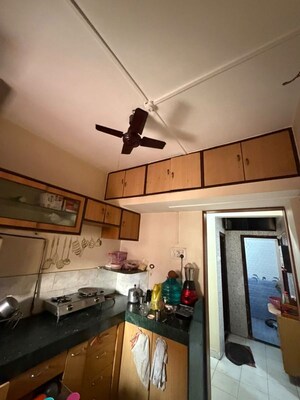 Kitchen in 1 BHK Apartment at Swastik Park CHS, Ghodbunder Road – for Rent