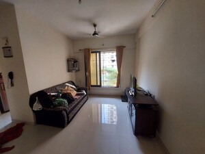 Living Room in 1 BHK Apartment at JVM Twin Tower, Kasarvadavali – for Rent