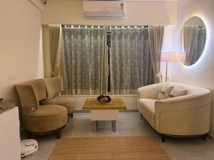 Living Room in 2 BHK Apartment at Model Town, Andheri West – for Rent