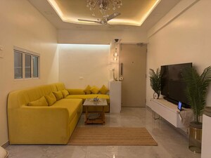 Living Room in 2 BHK Apartment at Model Town, Andheri West – for Rent