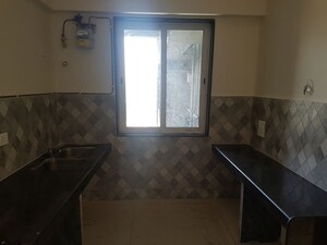 Kitchen in 2 BHK Apartment at Shraddha Vardaan, Bhandup West – for Rent