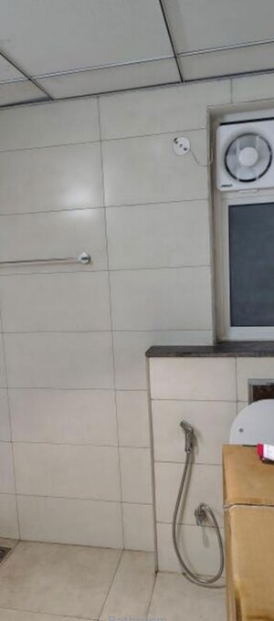 Bathroom in 2 BHK Apartment at Godrej The Suites, Sector 27 Yamuna Expressway – for Rent