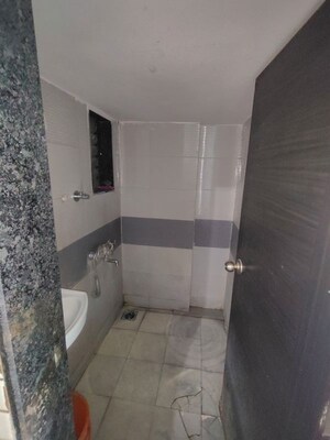 Bathroom in 1 BHK Apartment at Poonam Pallazo, Morya Nagar – for Rent