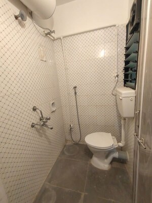 Bathroom in 1 BHK Apartment at Mahadkar Residency, Paud Road – for Rent
