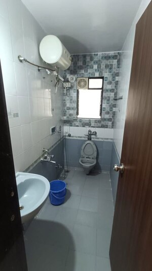 Bathroom in 3 BHK Apartment at Mokate Heritage, Kothrud – for Rent