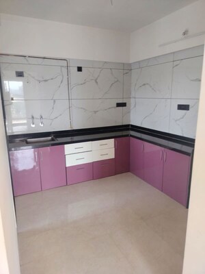Kitchen in 2 BHK Apartment at Ranjeet Heights CHS, Kothrud – for Rent
