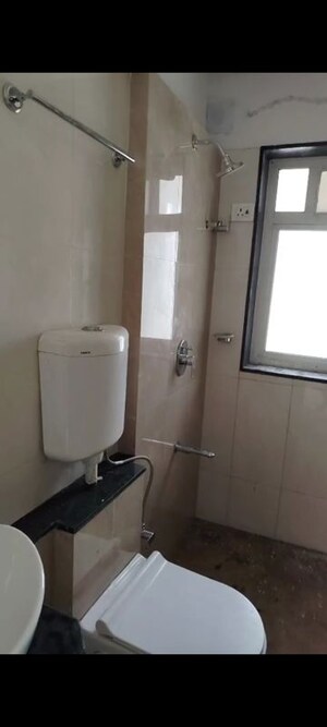 Bathroom in 2 BHK Apartment at Tata Mills CHS, Parel – for Rent