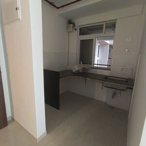 Kitchen in 1 BHK Apartment at Transcon Triumph Tower 2, Andheri West – for Rent