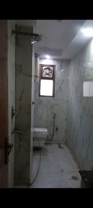 Bathroom in 3 BHK Builder Floor at Dashrath Puri – for Sale