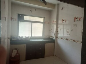 Kitchen in 1 BHK Apartment at RNA NG Regency Phase I, Balkum Pada – for Rent