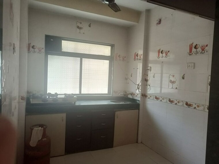 Kitchen, rna-ng-regency-phase-i 1 Bedroom 585 Sq.Ft. Apartment In Balkum Pada Thane 10768613