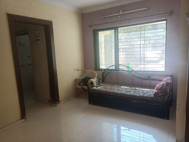 Living Room, rna-ng-regency-phase-i 1 Bedroom 585 Sq.Ft. Apartment In Balkum Pada Thane 10768613