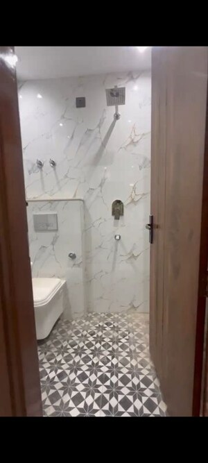 Bathroom in 3 BHK Builder Floor at Mahavir Enclave – for Sale