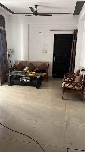 Living Room in 2 BHK Apartment at Nilaya Greens, Raj Nagar Extension – for Rent