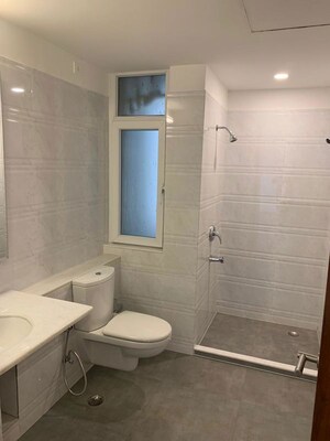 Bathroom in 4 BHK Apartment at Emaar The Vilas, Sector 25 – for Rent
