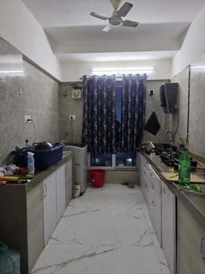 Kitchen in 2 BHK Apartment at Rishabraj Sujai, Malad East – for Rent
