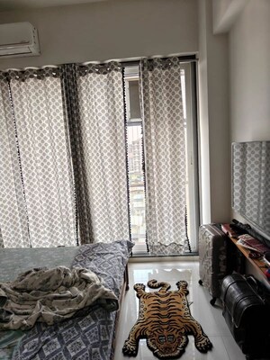 Room in 2 BHK Apartment at Tricity Eros, Kharghar – for Sale