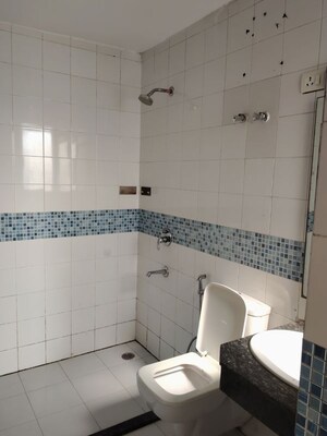 Bathroom in 3 BHK Apartment at Unitech Uniworld Gardens 2, Sector 47 – for Rent