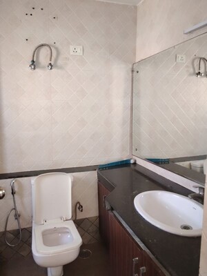 Bathroom in 3 BHK Apartment at Unitech Uniworld Gardens 2, Sector 47 – for Rent