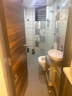 Bathroom in 1 BHK Apartment at Amit Estate, Andheri West – for Rent
