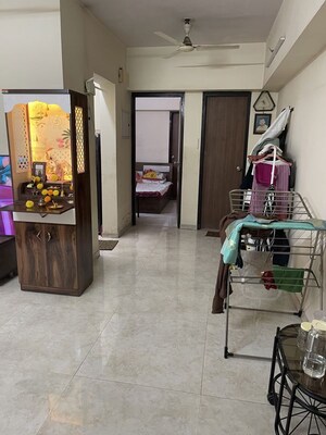 Living Room in 1 BHK Apartment at Lodha Amara, Kolshet Road – for Rent