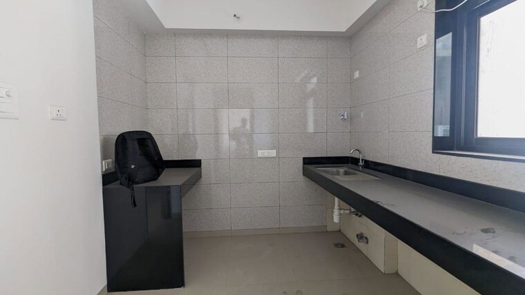 Kitchen, celestia-spaces 2 Bedroom 840 Sq.Ft. Apartment In Parel Mumbai 10768957