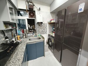 Kitchen in 2 BHK Apartment at Navkarmik Shiv Shubharambh, Malad East – for Sale