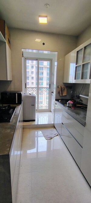 Kitchen in 2 BHK Apartment at Hiranandani Estate Barca, Ghodbunder Road – for Sale