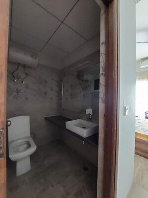 Bathroom in 1 RK Apartment at Paramount Oak, Zeta I Greater Noida – for Rent