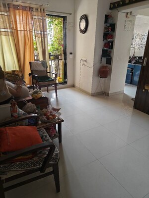 Living Room in 2 BHK Apartment at Unnati Woods CHS, Kasarvadavali – for Rent